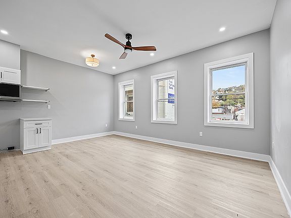 Open concept kitchen/dining/living room