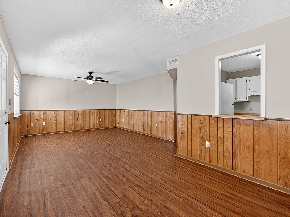 Living room/dining room combo with ceiling fan