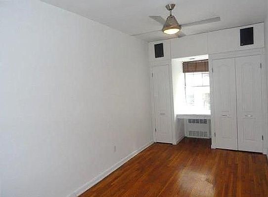 4th image of 239 E 18th St APT 1A