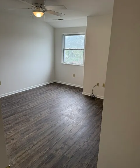 Primary with 2 closets and direct bathroom access. New flooring, fan, and freshly painted!