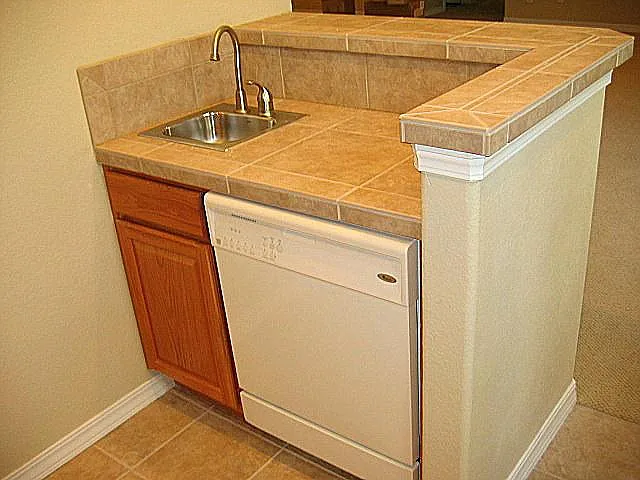 Basement bar sink, dishwasher.