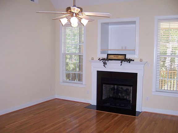 Large, Open Living Room with TV Nook and Cathedral Ceilings