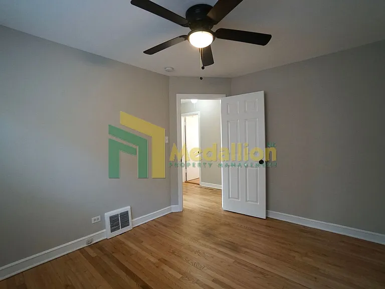 9858 S Drexel Ave — Photo 6