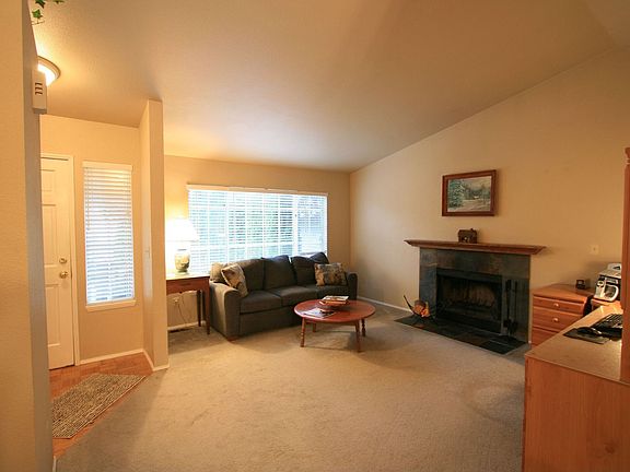 Living room with vaulted ceilings 