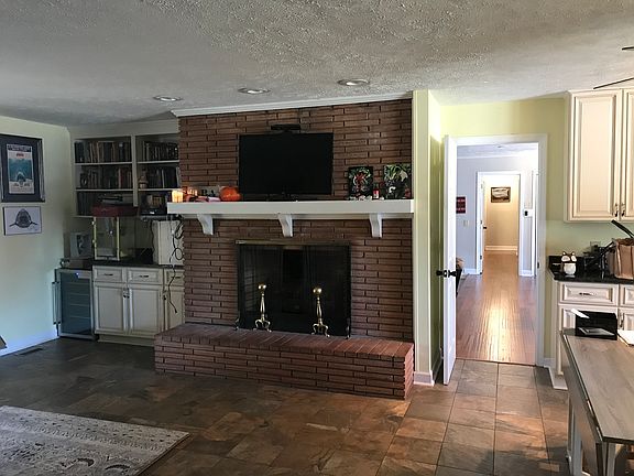 Den with gas fireplace