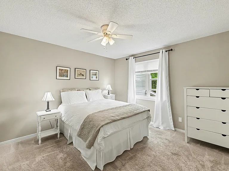 Primary bedroom with queen bed