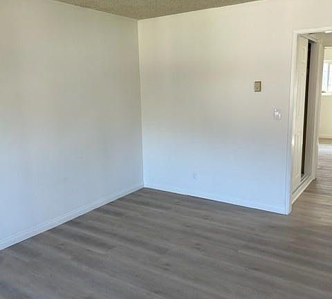 Living room new flooring through out apartment