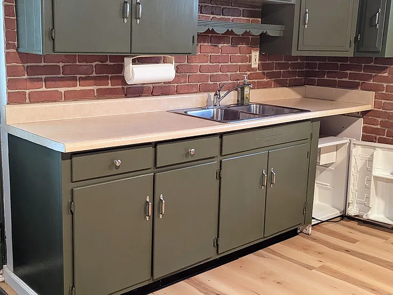 Kitchenette area, but no stove on this level.