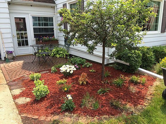 next to driveway