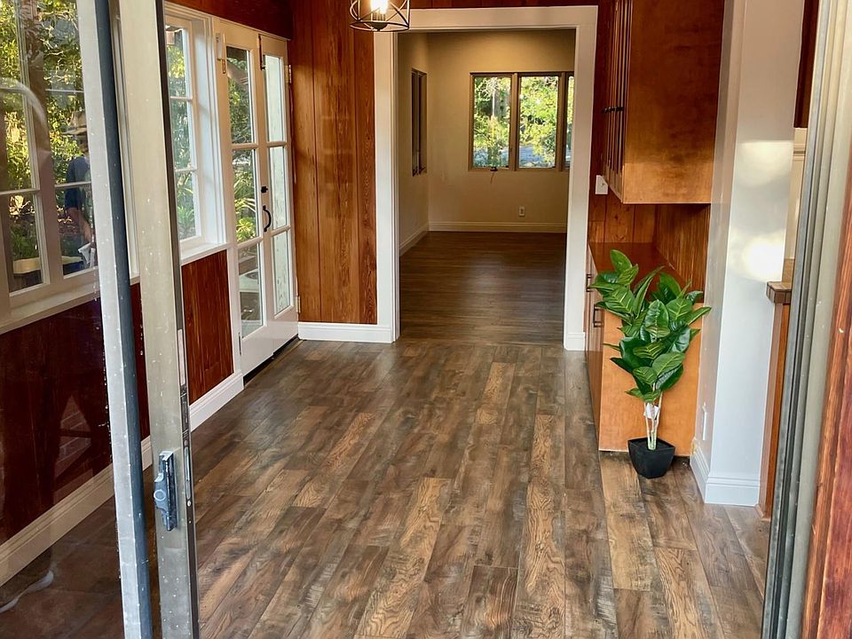 View through dining to great room from back porch