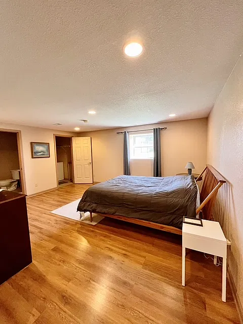 Bedroom 1 has plenty of space, Queen Bed with a side table with a phone charger built in and drawer. Also a dresser with a TV, Roku included.