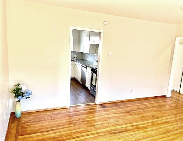 Living room looking toward kitchen