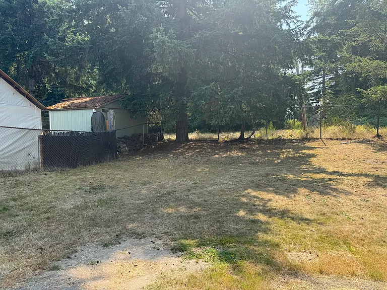 Backyard facing southeast. Open space to south.