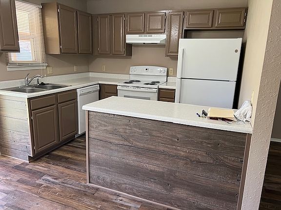 Kitchen - new flooring, refrigerator, stove/oven / dishwasher