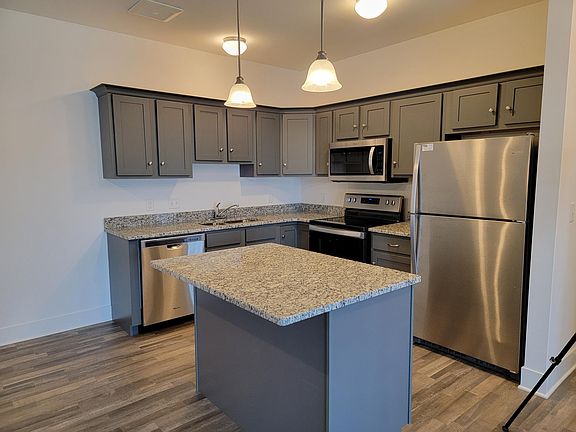 End Unit - Kitchen with Granite Countertops and Stainless Steel Appliances