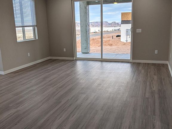 Living area with views of Lone Rock, Kaparawits Plateau, & Lake Powell.