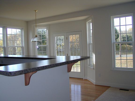 Eat-in kitchen, hardwood floors granite countertops