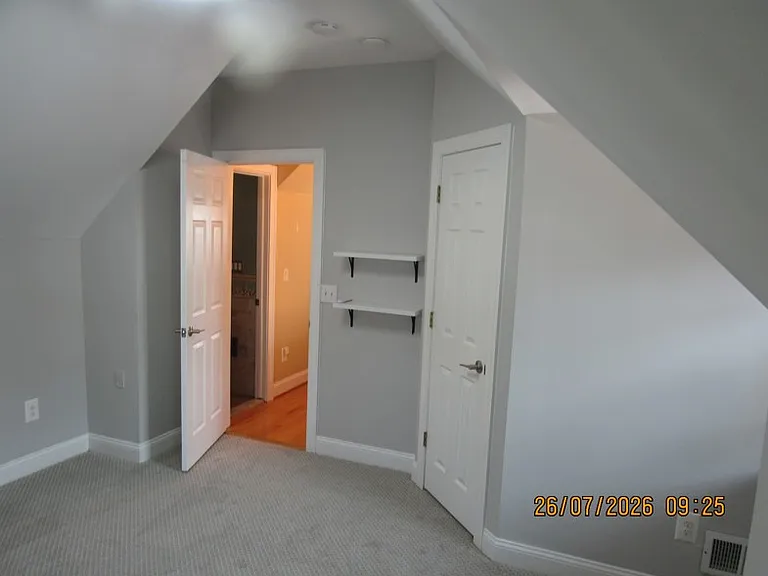 the other upper bedroom,
