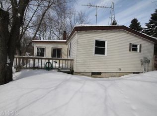 13549 Deaner Rd, Howard City, MI 49329