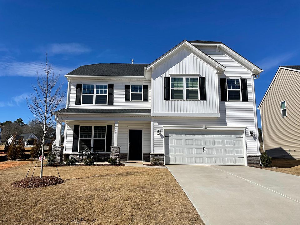 Better than new 2 story home in Stratford with rocking chair covered front porch.