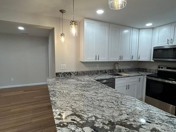 This condo has gorgeous hanging lights!