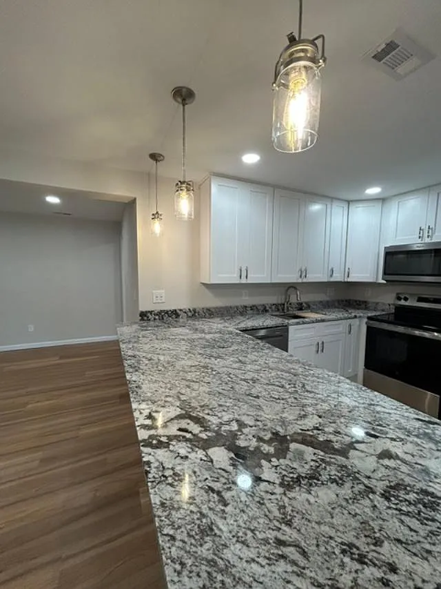 This condo has gorgeous hanging lights! - 1791 Sherman Dr
