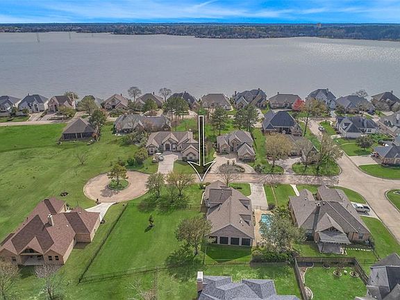 Located on 2 lots and walking distance from Lake Conroe.