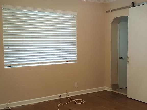 Master bedroom w/ barn door