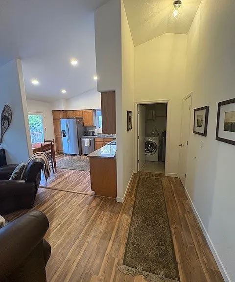 From the entryway to the garage and kitchen area