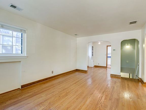 Gorgeous hardwood floors, arch detail