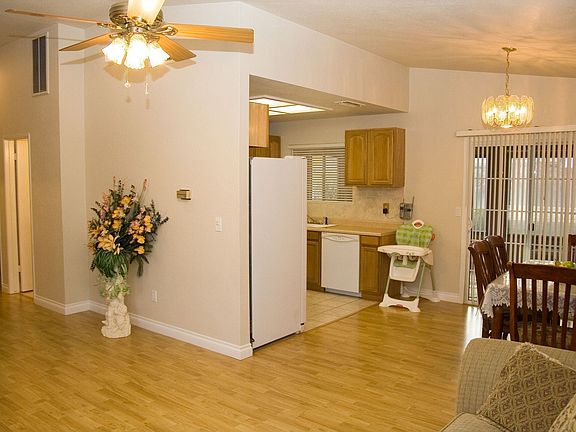 Laminate wood floors and 7in baseboards 