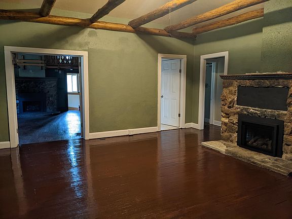 Living room with newly stained floors
