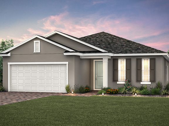 Home Exterior FM1A with decorative brick paver driveway