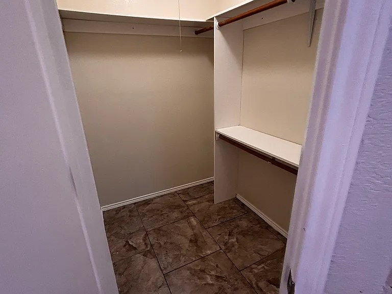 Her closet on master bathroom