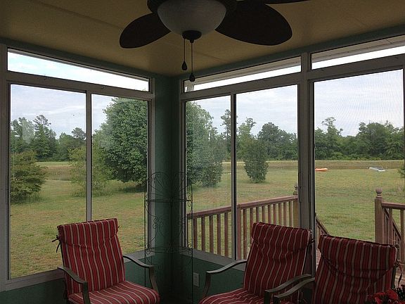 Sun room view of pond
