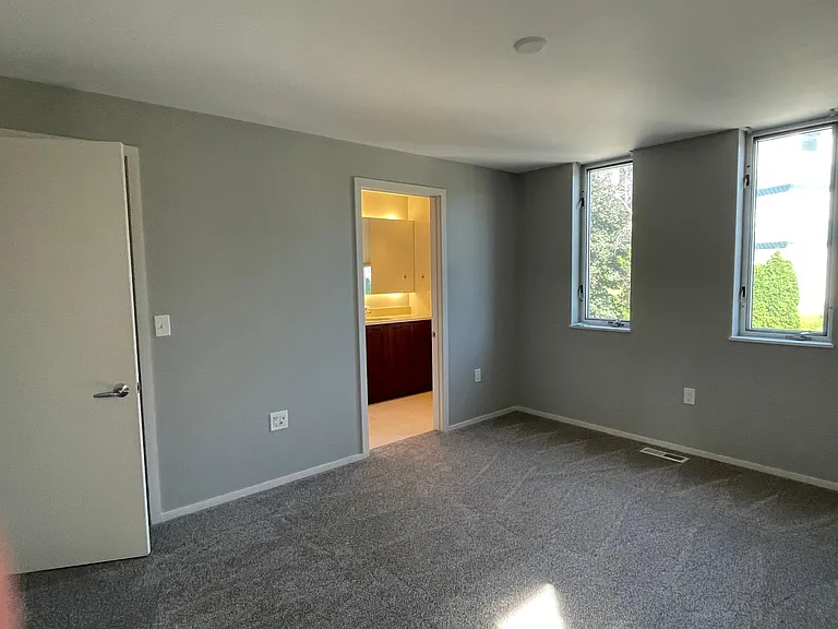 2nd Bedroom with Ensuite Bath and Walk-In Closet