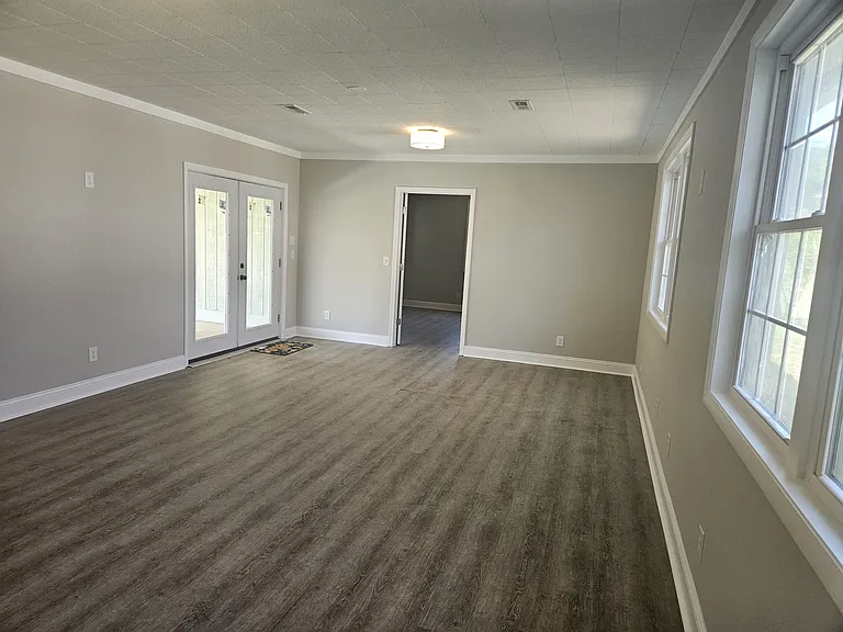 Family room looking toward primary bedroom