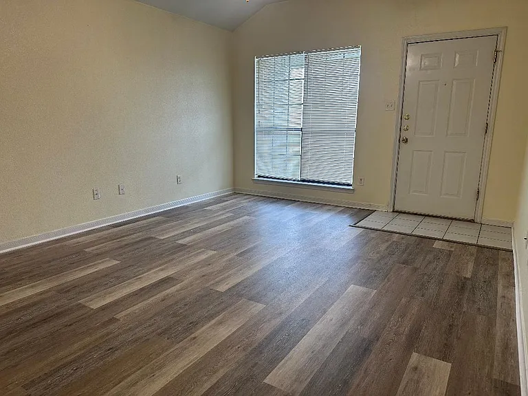 LIVING ROOM VIEW FROM DINING AREA