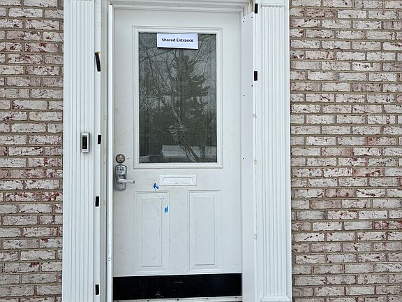 Shared entrance takes you to the mud room