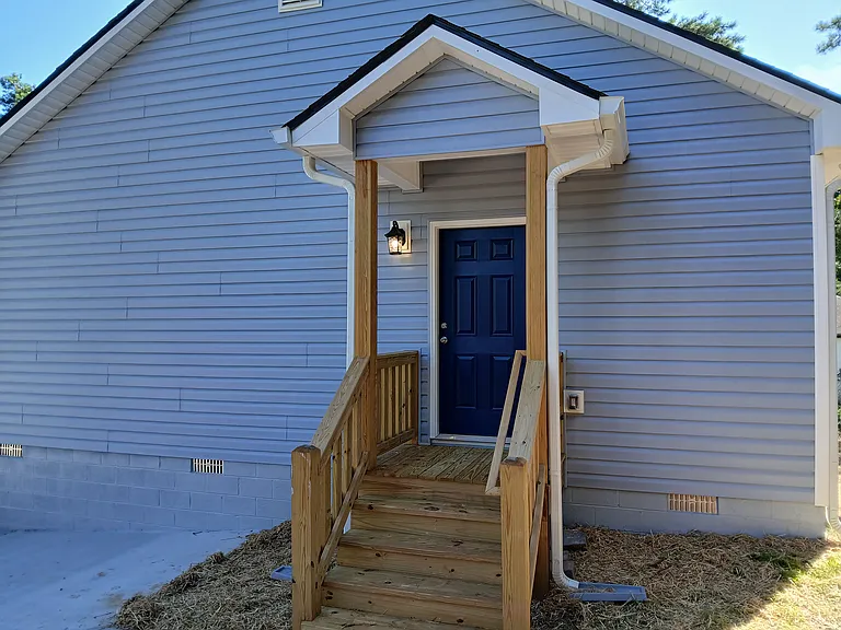 Side entrance to dining and kitchen.