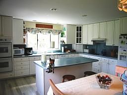 Large bright and airy kitchen with center island