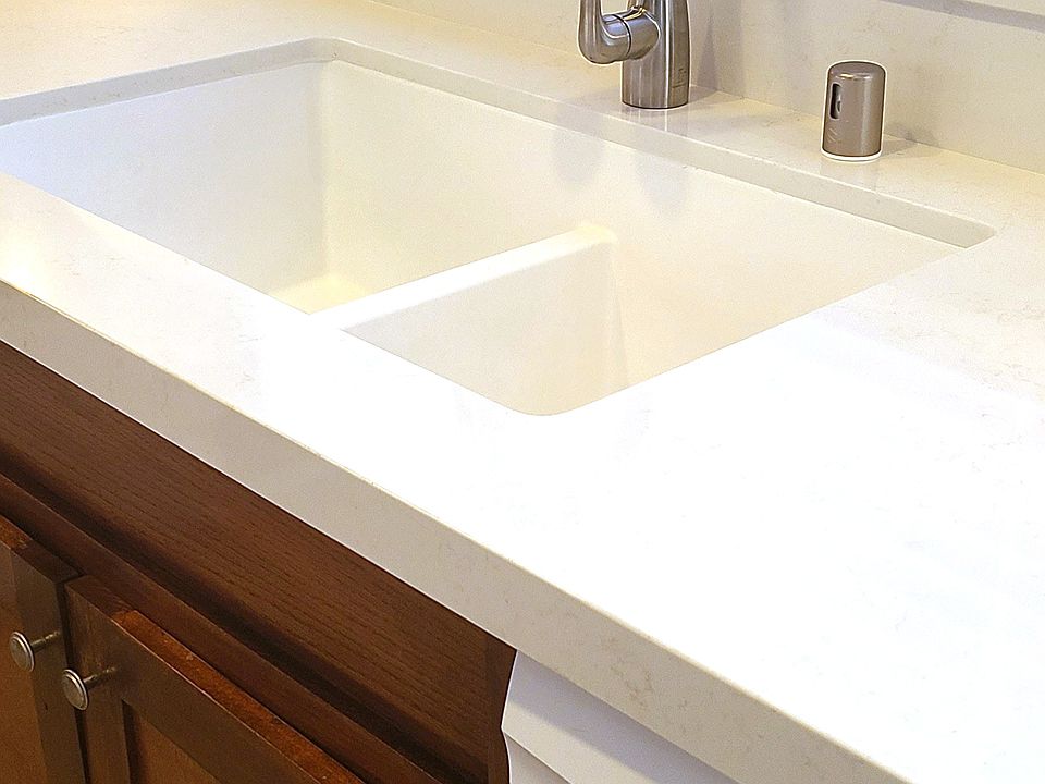 Kitchen with modern undermount sink and spray faucet