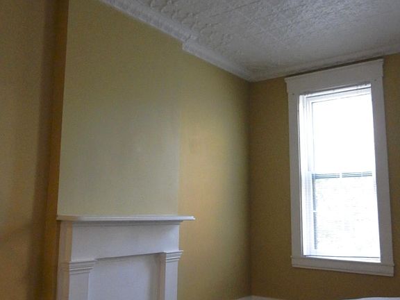Large bedroom (on 2nd floor), with wall-to-wall carpet, 10'