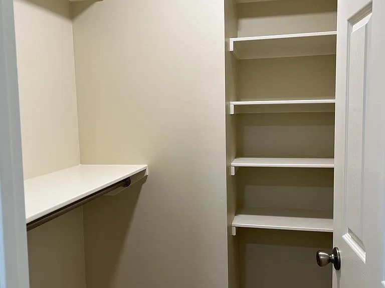 MASTER BEDROOM WALKING CLOSET