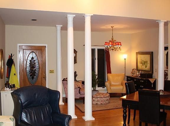 Dining room features hardwood floors and is just off of the entry. 