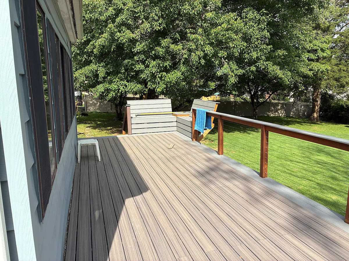 Trex deck, w/built-in seating, 10x20' attaches to sunroom. - 7108 Gainesborough Dr