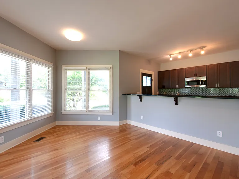 Great space for your dining room surrounded by windows