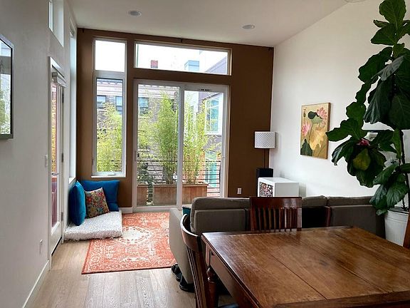 Sliding glass doors in the living room let in plenty of light