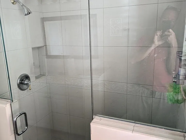 Bathroom #2. Glass shower with built-in dispensers.