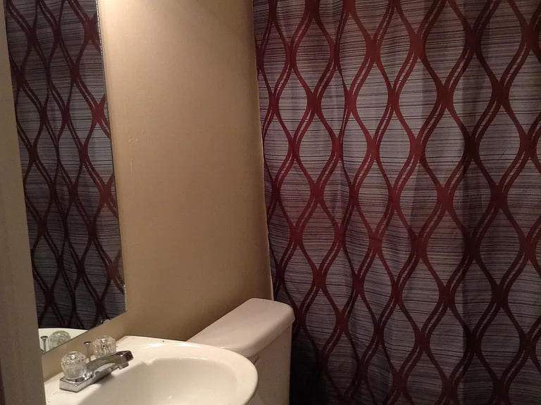 Bathroom with pedestal sink.